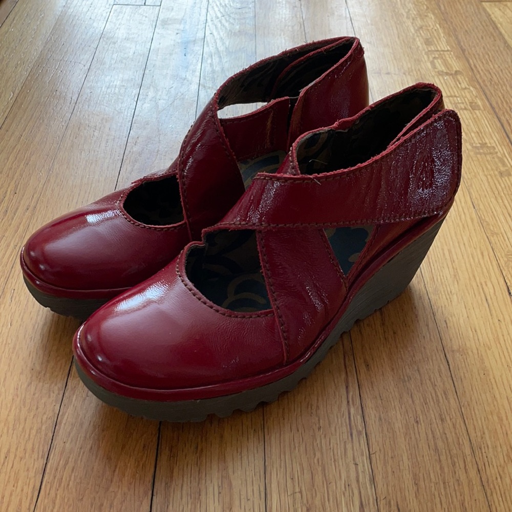 Fly London Red Patent Leather Crisscross Wedges